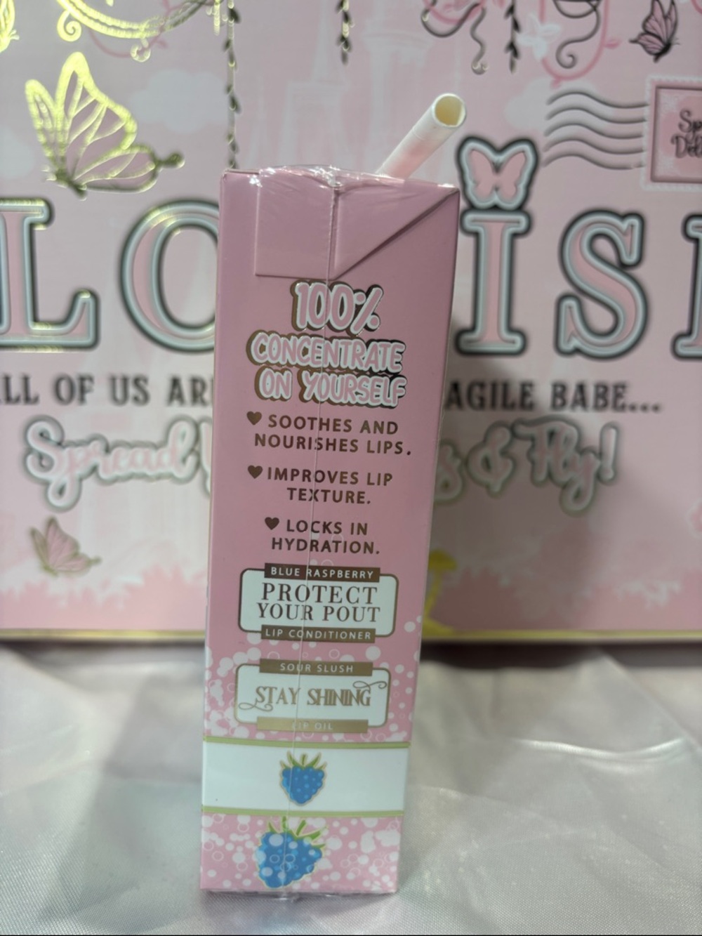 Plouise Bad B Energy Lip Gloss - Blue Raspberry (Pink & Green Packaging) - Picture 3 of 3